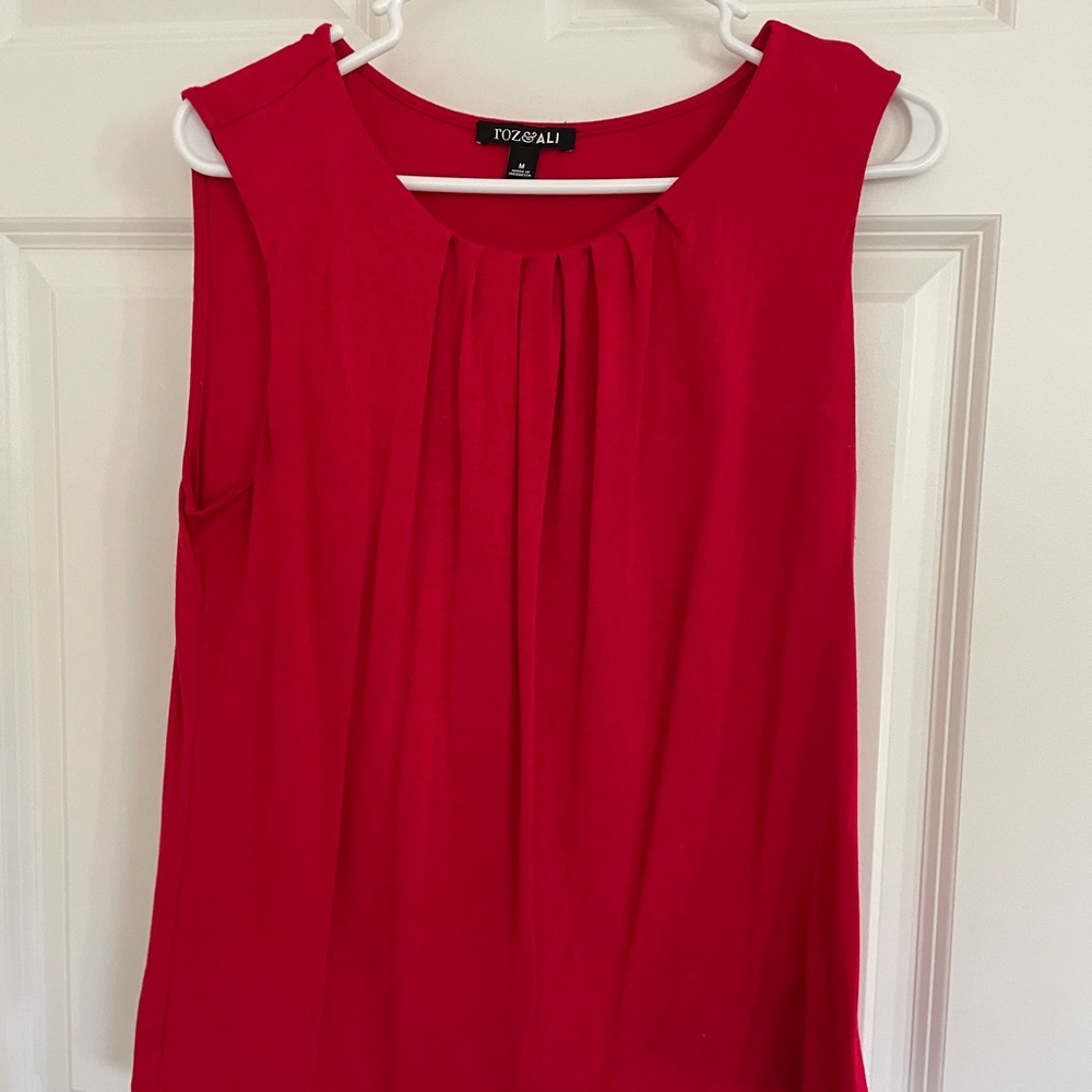 Red sleeveless top